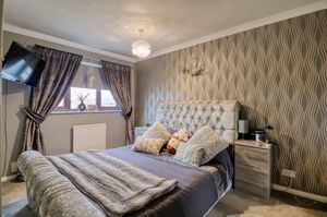 Bedroom One- click for photo gallery